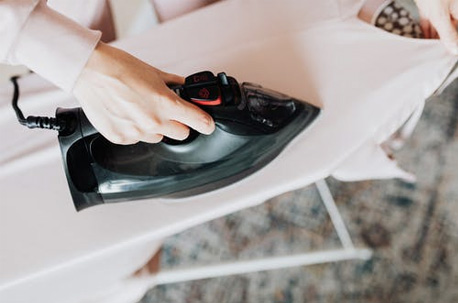 Person Using a Flat Iron